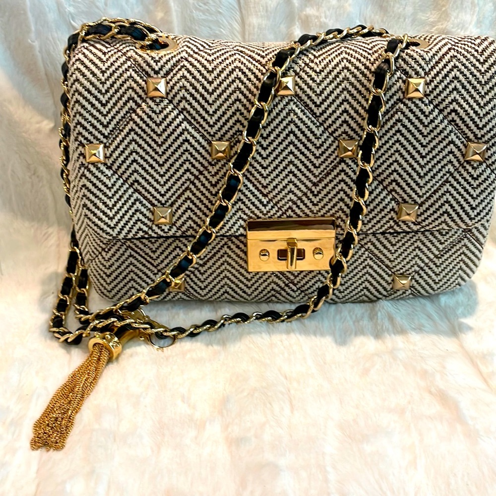 Aldo. Gold,cream & black crossbody/ handbag. Gold metal tassel & chain handles
